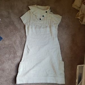 A tan sweater dress